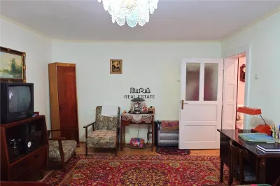 Gospodarie cu teren generos si constructii solide intr-o zona linistita - foto 7