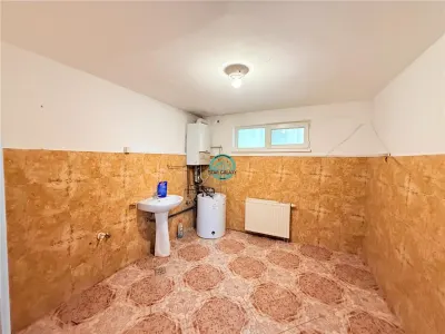 Vand casa in Sancrai cu 5 camere, 2 bai avand un teren generos de 1000mp - foto 19