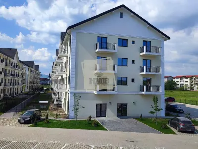 Apartament cu 3 camere 2 bai parcare si curte 57 mp in Selimbar - foto 2