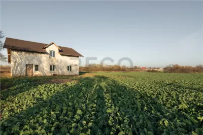 RECO casa Inand la rosu cu teren imens - Inand