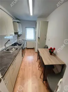 De vanzare apartament renovat cu 3 camere 2 bai si pivnita in Sibiu - foto 5