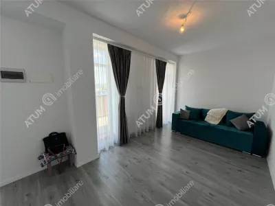 De vanzare apartament cu 2 camere terasa 40 mp si 2 locuri de parcare situat in zona Vasile Aaron din Sibiu - foto 3