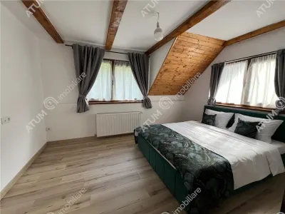 De vanzare cabana cu 7 camere 7 bai si teren 1000 mp in Avrig zona Mlaci - foto 5