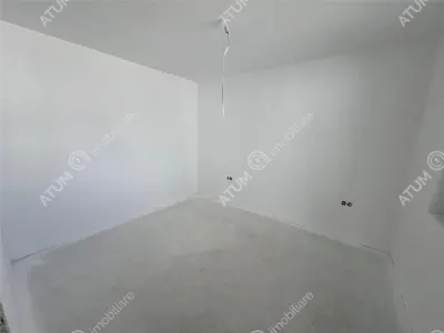 Casa de vanzare cu 4 camere 2 bai 2 balcoane si curte libera de 50 mp situata in zona Calea Cisnadiei din Sibiu - foto 24