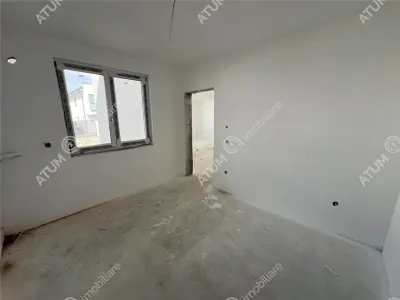 Casa de vanzare cu 4 camere 2 bai 2 balcoane si curte libera de 50 mp situata in zona Calea Cisnadiei din Sibiu - foto 25