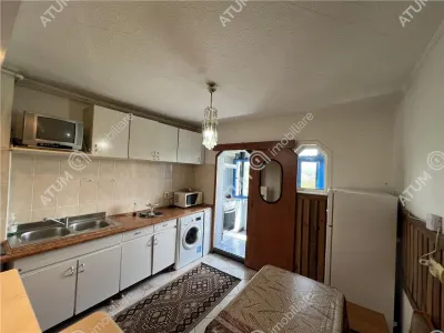 De vanzare apartament cu 2 camere decomandate cu boxa si pivnita zona Vasile Aaron din Sibiu - foto 7