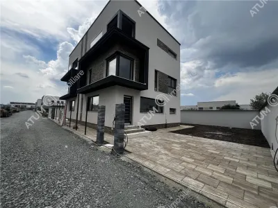 De vanzare casa moderna cu 4 camere 3 bai si teren de 214 mp in Selimbar zona Triajului - Sibiu