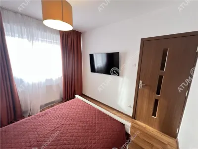 De vanzare apartament mobilat si utilat cu 3 camere 2 bai pivnita situat in zona Turnisor din Sibiu - foto 13
