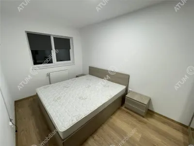 De inchiriat apartament cu 3 camere decomandate balcon si loc parcare in zona Magnolia din Sibiu - foto 4