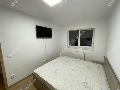 De inchiriat apartament cu 3 camere decomandate balcon si loc parcare in zona Magnolia din Sibiu - foto 5