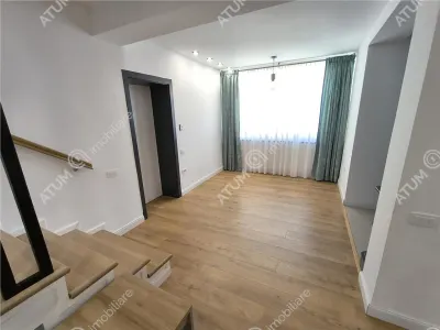 De inchiriat casa ultramoderna cu 4 camere 3 bai si dressing 170 mp utili in Sibiu - foto 14