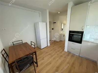 De vanzare garsoniera la etajul 1 cu balcon si loc de parcare in cartierul Da Vinci din zona de Vest Sibiu - foto 6