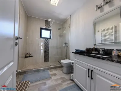 Vila impunatoare cu 6 camere spatioase in stil american - foto 18